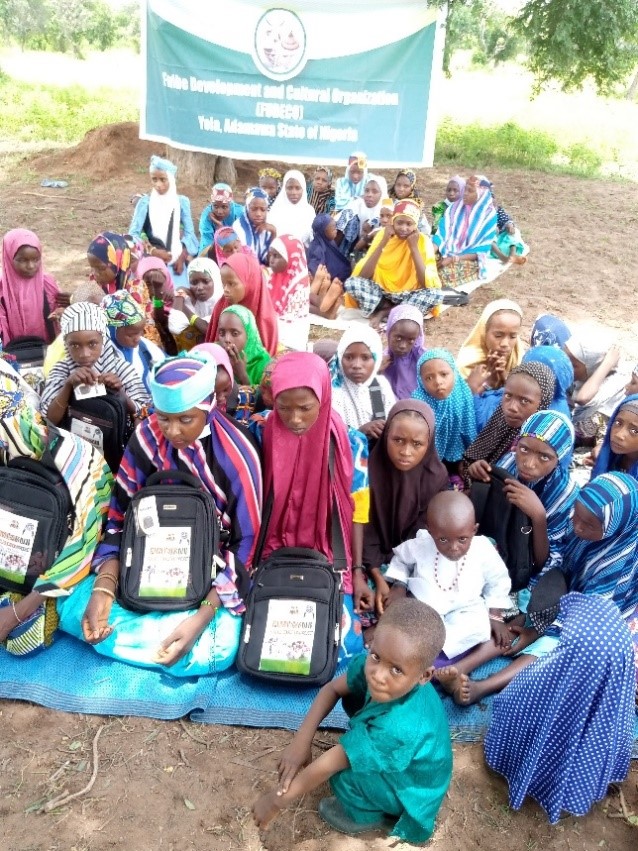 Girls from Mayo Inne village with their school bags - image by FUDECO