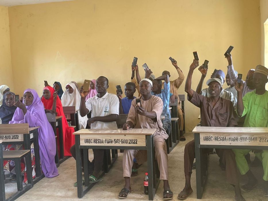 Phone ownership among men and women smallholder farmers - Mercy Corps AgriFin visiting one of its partners Zowasel's Tugugu crop centre in Bunkure, Kano State, Nigeria - Image by Mercy Corps AgriFin