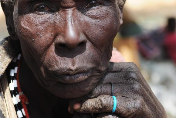 Close up of an elderly woman looking at the camera