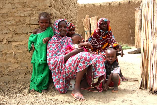 A family outside of their home in Gaoui, Chad