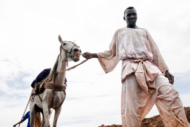 Internally displaced people settled in Dali camp, North Darfur, farm land rented by local owners for the rainy season