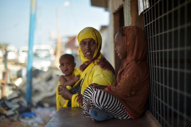 A mother speaks with her daughter at Dayniile IDP camp, Mogadishu, Somalia.