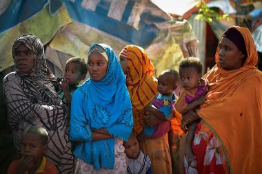 Somali women stand near a water point at Dayniile IDP camp in Somalia - Image by UN/ Tobin Jones - CC BY-NC-ND 2.0