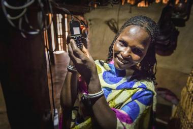 Jilo Tuke Dureti, from Dabassa Jaldessa, Somali Region, Ethiopia, uses a solar light and cell phone charger to light her home and charge neighbours' phones for a small fee, further increasing her ability to be self-sufficient.