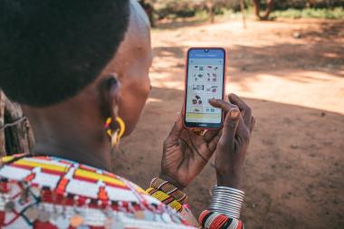 A Samburu woman from Northern Kenya enters data into the Mbiotisho app. Credit: ILRI
