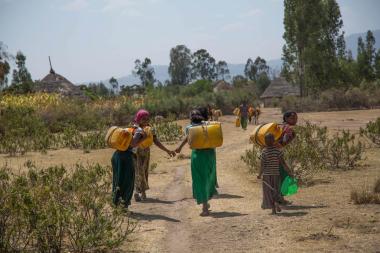 Women carry water back to their homes in Wolgeba village in Halaba Zone - Image by UNICEF/ Nahom Tesfayeby - CC BY-NC-ND 2.0